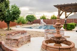 The ultimate resort ranch style pool home on nearly a half acre!