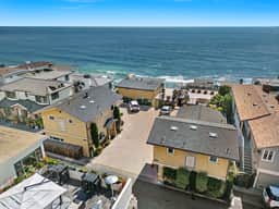 Enjoy the ocean breezes, swim, bike, stroll to main beach 1