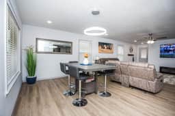 Brand new home with Deluxe Game Room and Bar. Location!