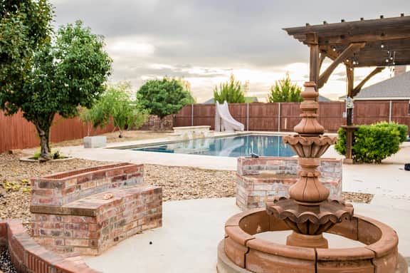 The ultimate resort ranch style pool home on nearly a half acre!