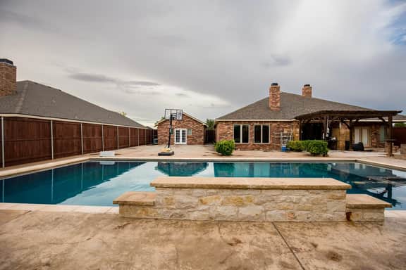 The ultimate resort ranch style pool home on nearly a half acre!